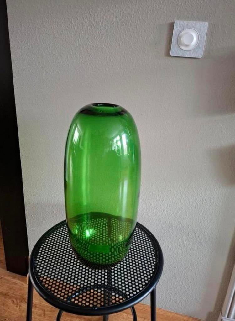 Groene vaas, Ophalen