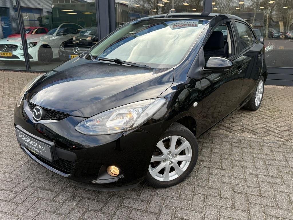 Mazda 2 5 deurs elektrisch pakket! (bj 2009), 0 cilinders, Gebruikt, Zwart, Bedrijf