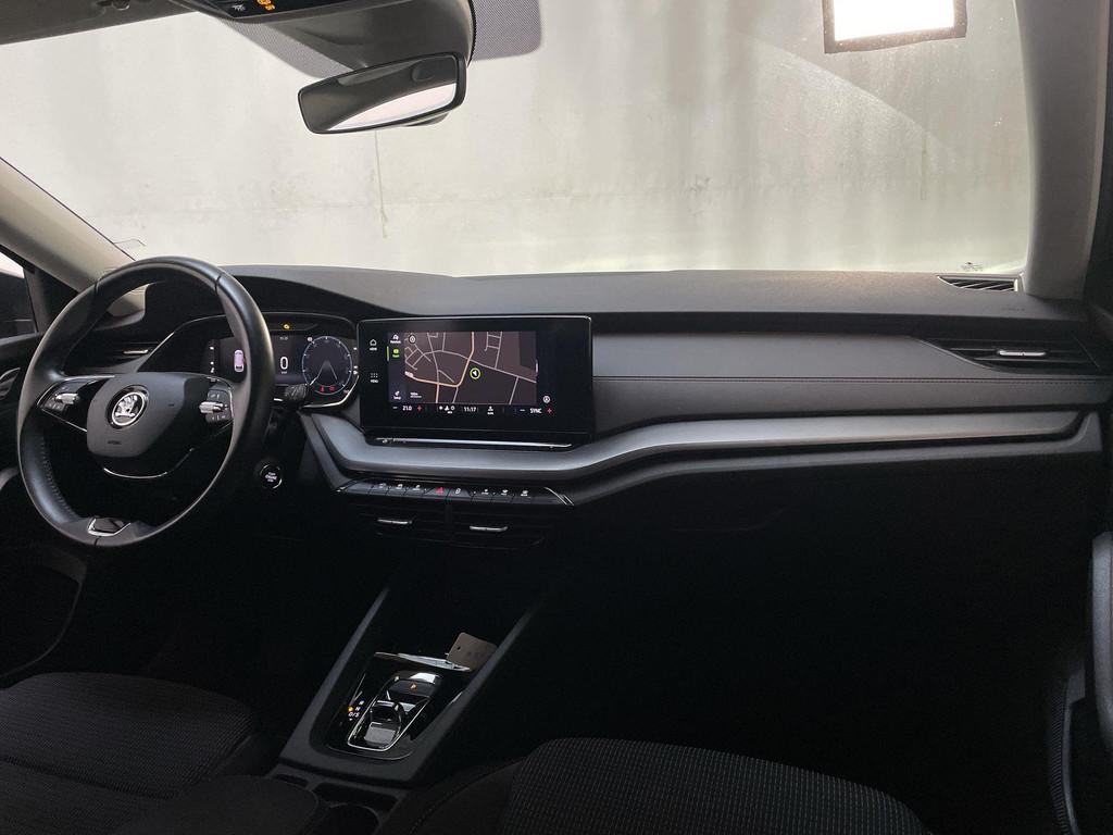 Skoda Octavia Combi 1.0 e-TSI DSG Business Edition Virtual C, Stof, Gebruikt, Met garantie (alle), Grijs