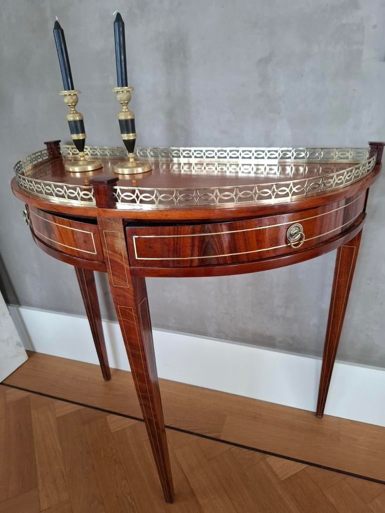 Empire halve maan tafeltje, Ophalen