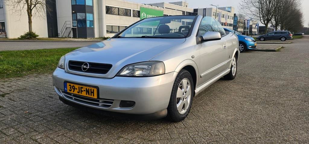 Opel Astra 1.6 16V Cabrio 2002 Grijs, Auto's, Voorwielaandrijving, Stof, Zwart, 4 cilinders