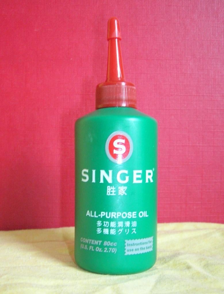 SINGER VOL BUSJE OLIE MET SINGER TEKST GROEN, Ophalen of Verzenden, Nieuw, Reclamebord