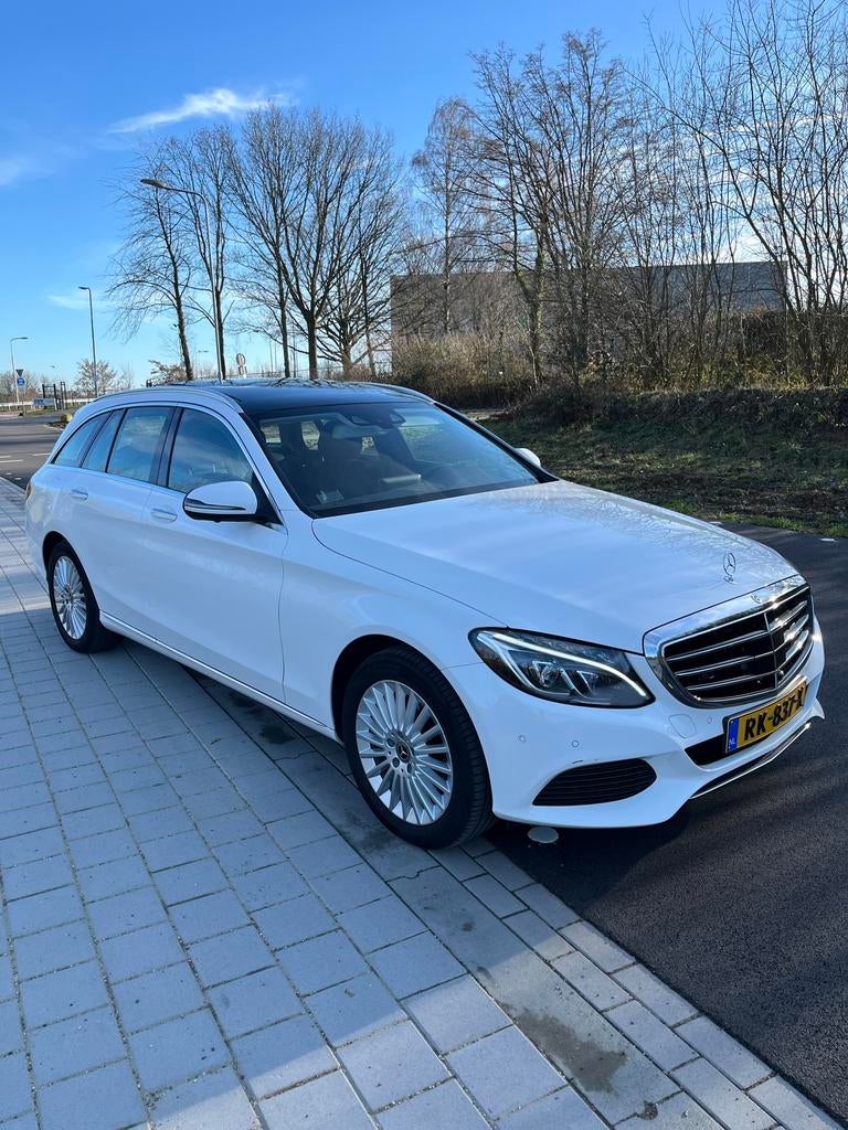 Mercedes-Benz C-klasse 200 Rijassist-Panodak-Memory-Keyless-, Achterwielaandrijving, 1800 kg, Zwart, 4 cilinders
