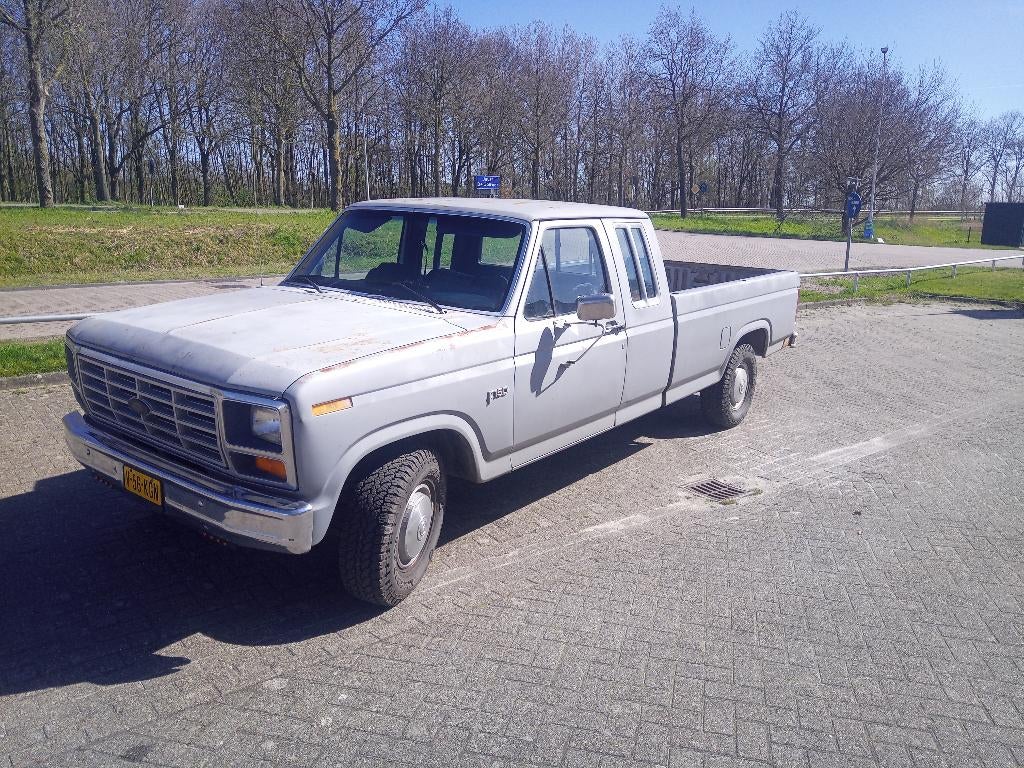 te koop ford f150 1984, Auto's, Bestelauto's, Bedrijf, Bluetooth, Trekhaak, USB, Ford, Benzine, Automaat, Geïmporteerd, Zilver of Grijs