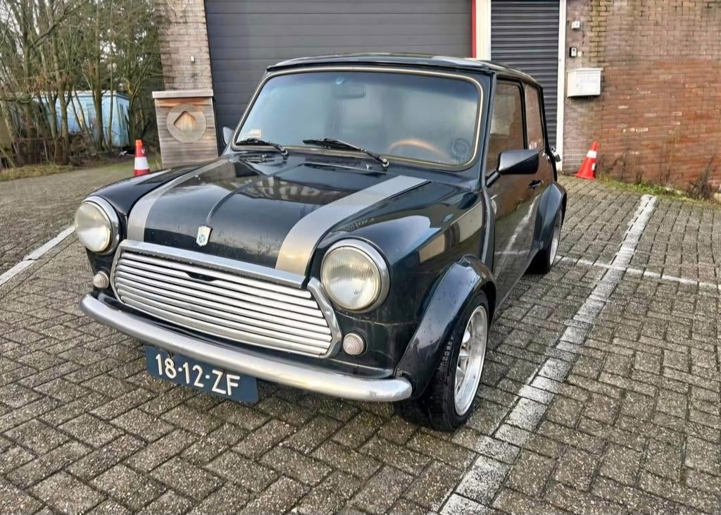 Mini 1300 1.3 1973 Zwart apkvrij en wegenbelastingvrij, Auto's, Voorwielaandrijving, 4 cilinders, Leder en Stof, Zwart