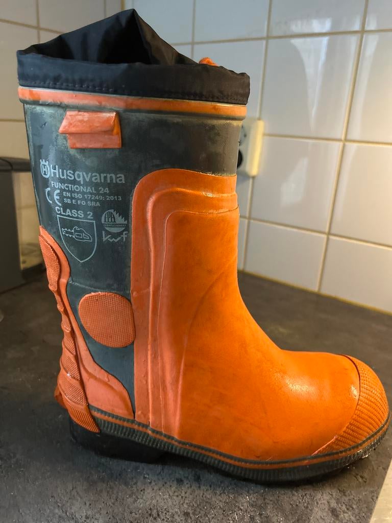 Husqvarna zaaglaarzen- Oranje - Nieuwstaat €60, Ophalen of Verzenden, Zo goed als nieuw, Overige kleuren, Regenlaarzen