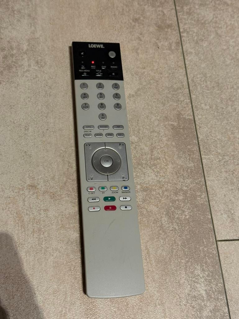 Originele Loewe Assist 2 afstandsbediening getest, Ophalen of Verzenden, Gebruikt, Origineel, Tv