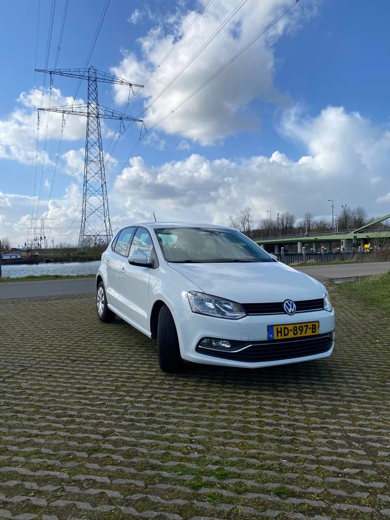 Volkswagen Polo 1.4 TDI 66KW BMT 2015 Wit, Auto's, Voorwielaandrijving, Stof, 1051 kg, Wit
