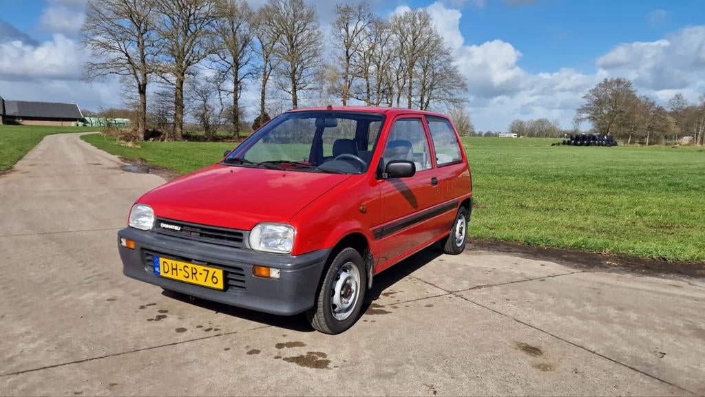 Daihatsu Cuore 0.8 U9 1991 Rood, Auto's, Daihatsu, Voorwielaandrijving, Cuore, Origineel Nederlands, 400 kg
