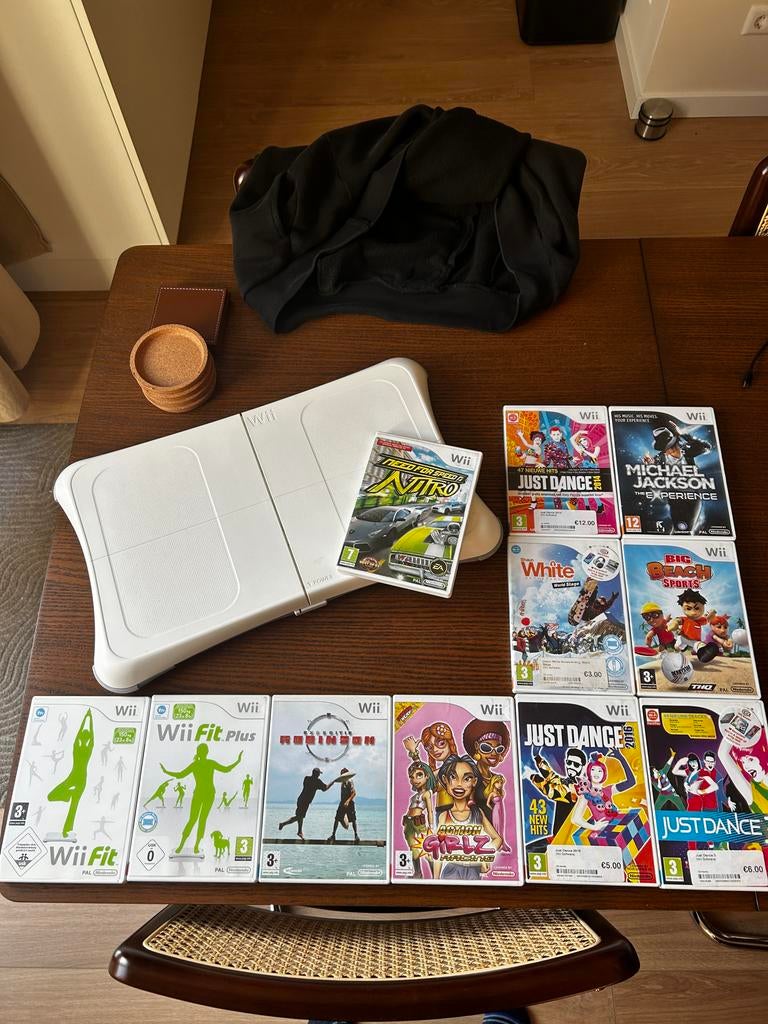 Wii Fit Board met diverse Wii spellen, Spelcomputers en Games, Games | Nintendo Wii, Gebruikt, Sport, 3 spelers of meer, Vanaf 3 jaar