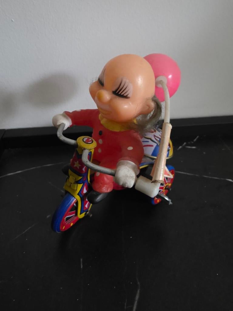 Vintage blikken opwindspeelgoed Clown op driewieler ballon, Ophalen of Verzenden