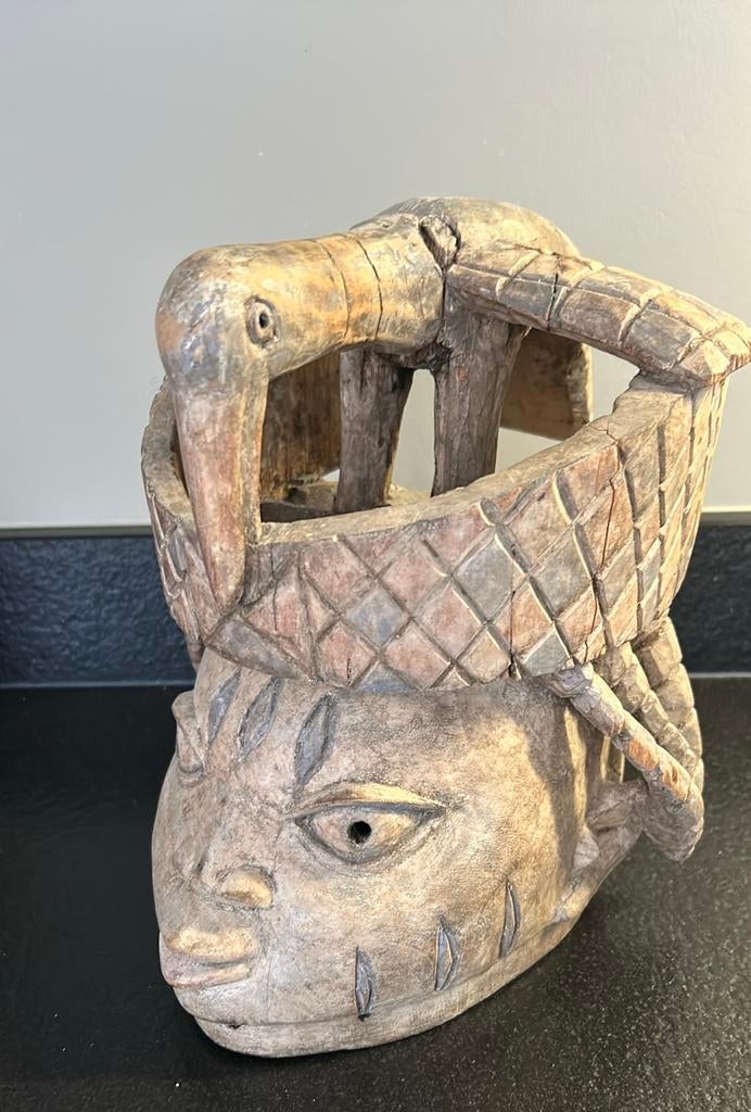 houten masker sulptuur van Afrikaanse afkomst, Ophalen