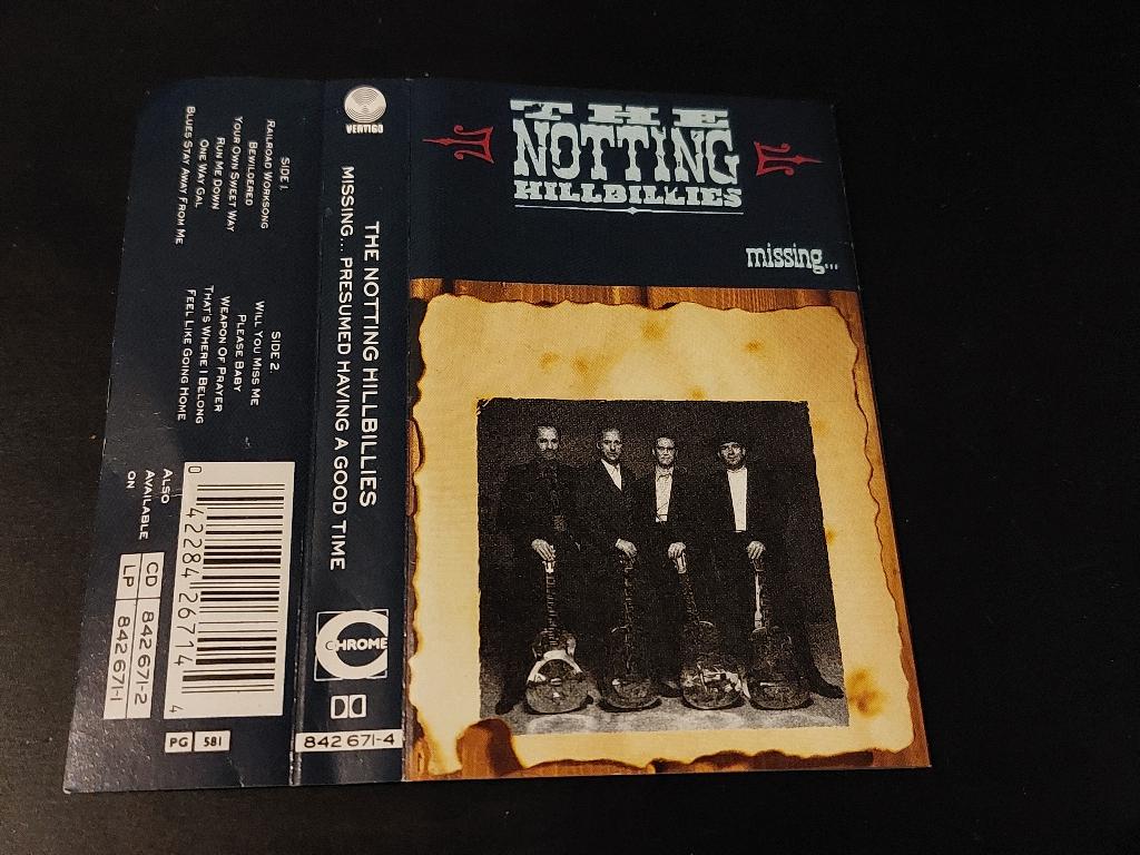 THE NOTTING HILLBILLIES - MISSING…PRESUMED HAVING A ... (MC), Cd's en Dvd's, 1 bandje, Ophalen of Verzenden, Zo goed als nieuw