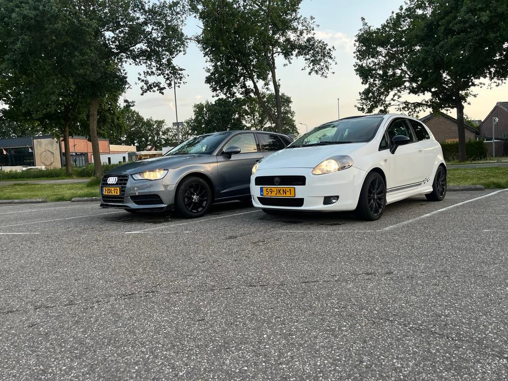 Fiat Punto 1.4 16V Turbo 3DR 2009 Wit, Auto's, Fiat, Voorwielaandrijving, 15 km/l, Zwart, 4 cilinders