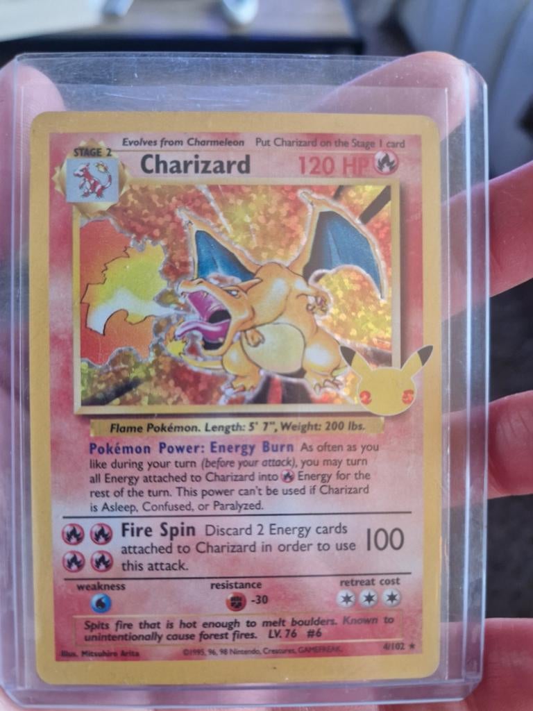 Pokemon Charizard 4/102, Ophalen, Zo goed als nieuw, Losse kaart