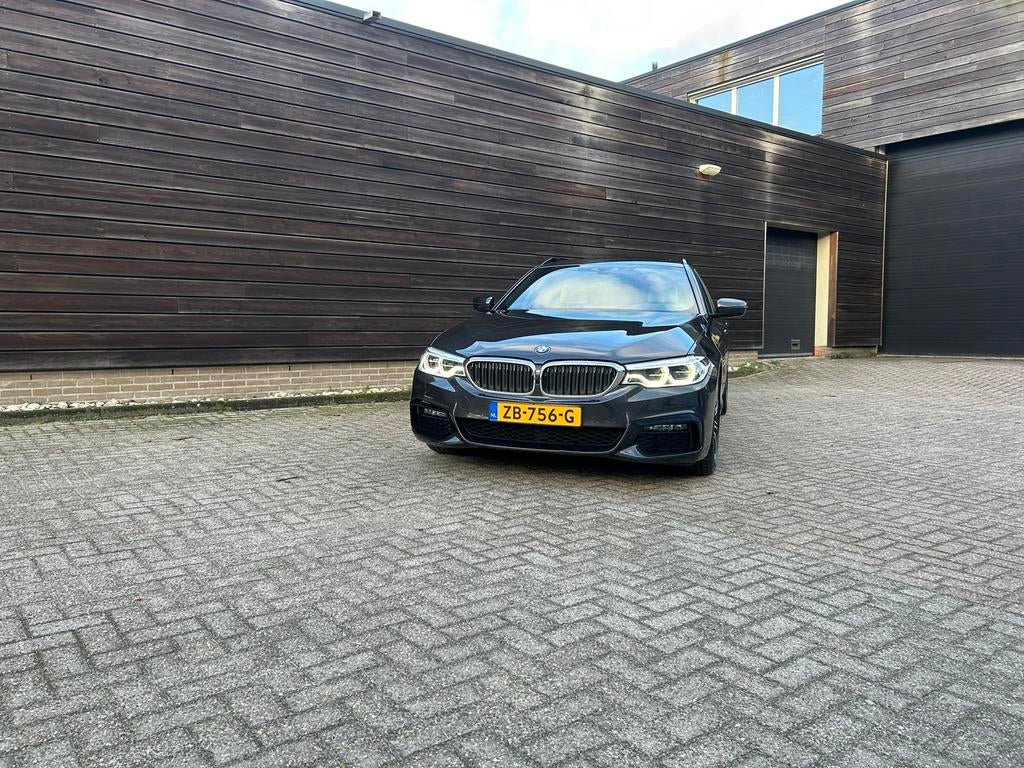 BMW 5-Serie 520i 184pk Aut. 2019 Grijs, Auto's, 1998 cc, Achterwielaandrijving, 1610 kg, 4 cilinders