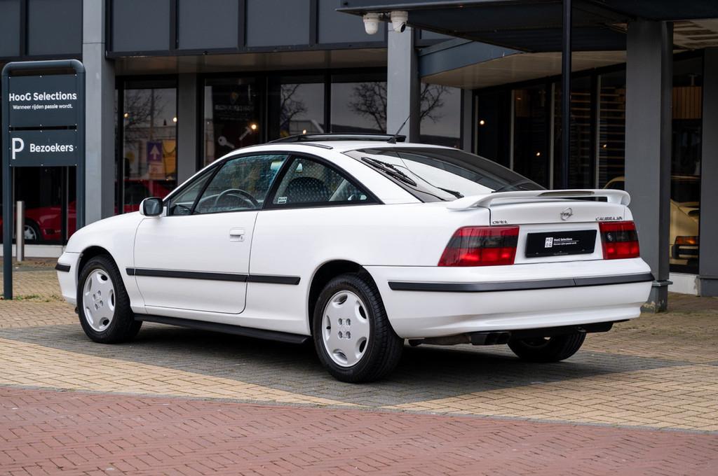 Opel Calibra 2.0i 16V (bj 1996), Auto's, Oldtimers, Lederen bekleding, 1998 cc, 136 pk, Zwart