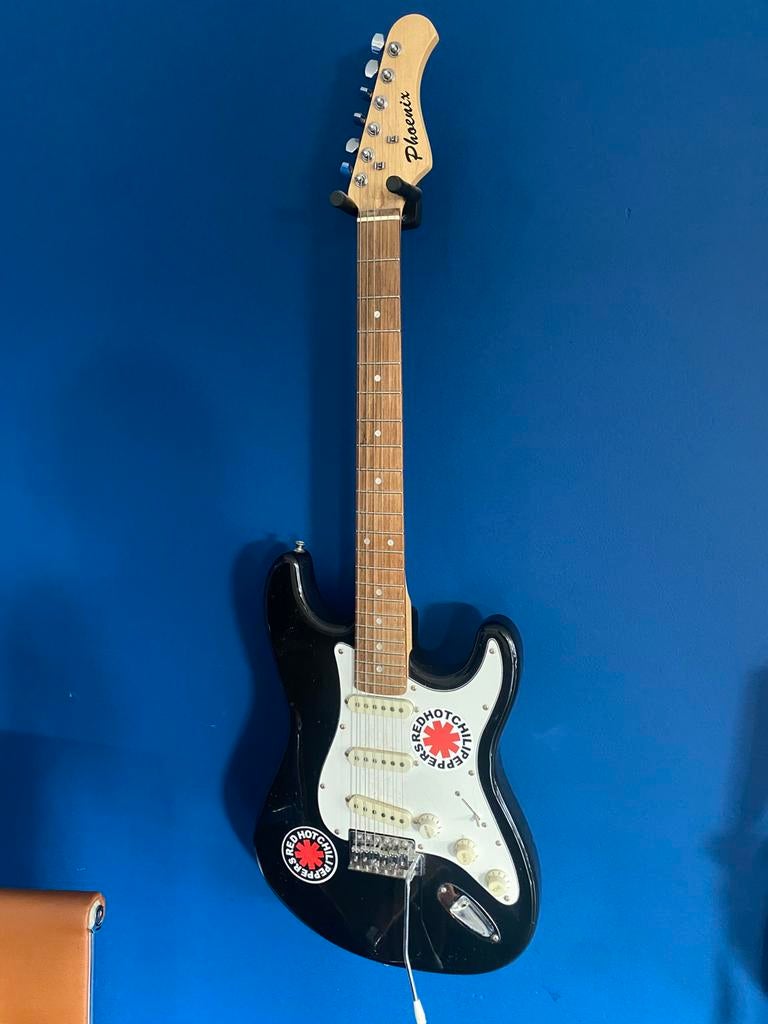 Elektrische gitaar, Ophalen, Gebruikt