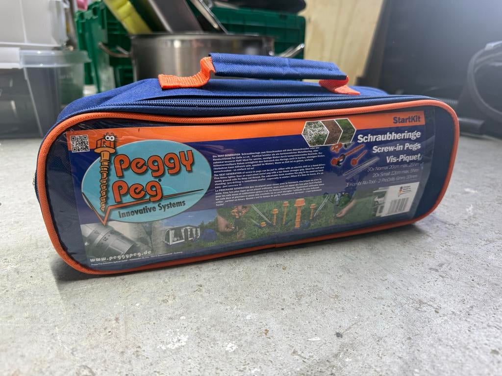 Schroef haringen Peggy peg, complete set, Caravans en Kamperen, Ophalen of Verzenden, Gebruikt