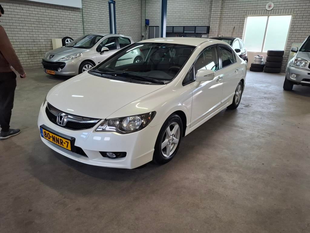 Honda Civic 1.3 Vtec Hybrid 4DR C-tr. 2010 Wit, Auto's, Wit, Origineel Nederlands, Grijs, 22 km/l