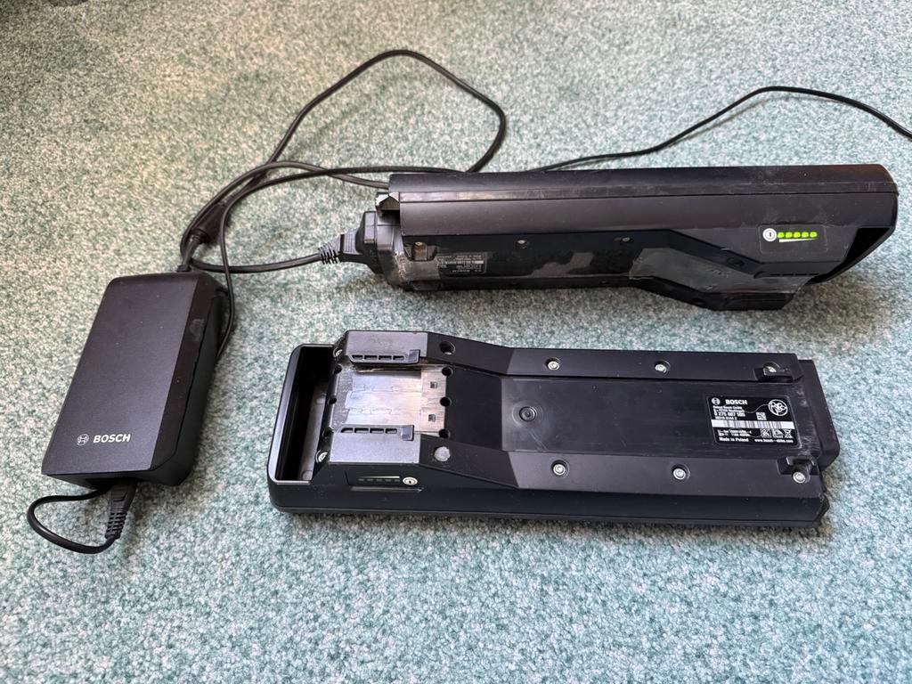 Oplader en twee accu’s, Ophalen, Gebruikt