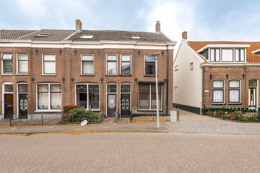 Hoekwoning in centrum van Tiel, Huizen en Kamers, Huizen te koop, Gelderland, Tot 200 m², 106 m², Hoekwoning