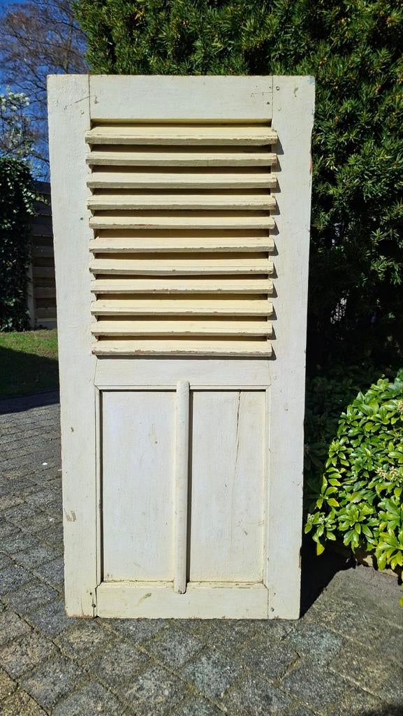 Brocant luik met Louvre details, Ophalen