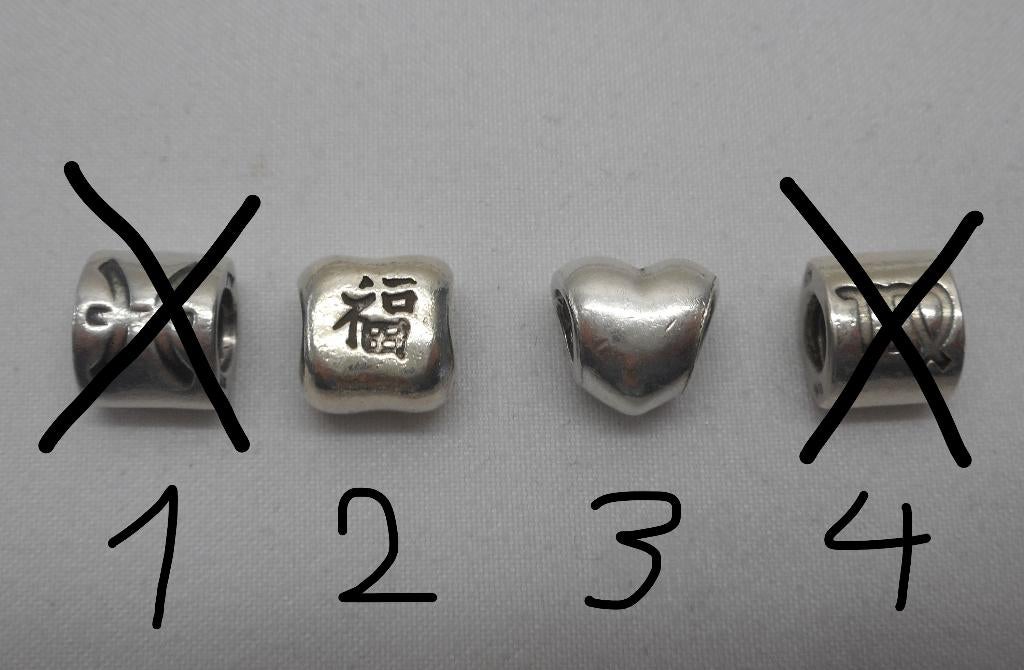 Zilveren originele Pandora bedels per stuk 12 euro nr.1664
