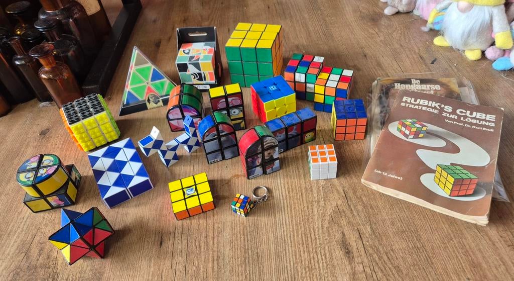 Rubik's Cube en andere puzzels met boekje, Ophalen of Verzenden