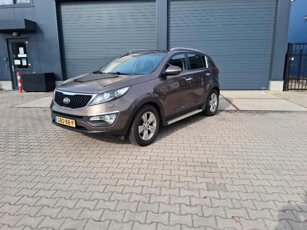 Kia Sportage 1.7 Crdi 85KW 2WD 2014 Bruin, Auto's, Kia, Voorwielaandrijving, Beige, 4 cilinders, Bruin