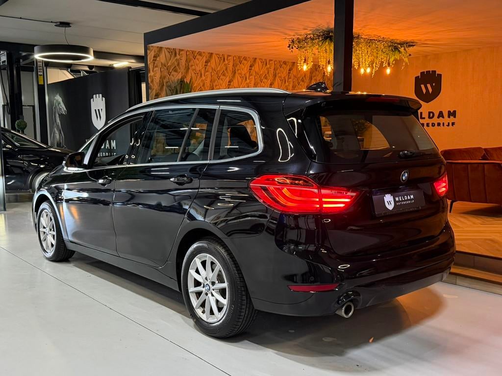 BMW 2-serie Gran Tourer 218i Executive Edition Garantie Crui, Auto's, BMW, Stof, Gebruikt, 2-Serie Gran Tourer, Zwart