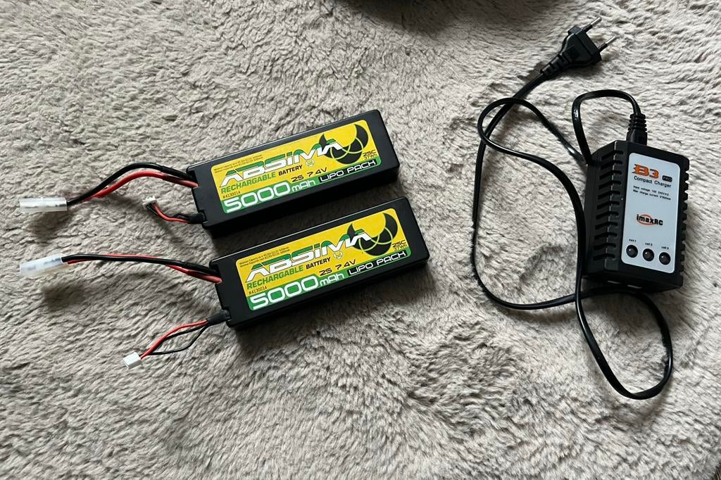 2 lipo batterijen voor RC autos of voerboten boten inc lader, Hobby en Vrije tijd, Modelbouw | Radiografisch | Auto's, Zo goed als nieuw