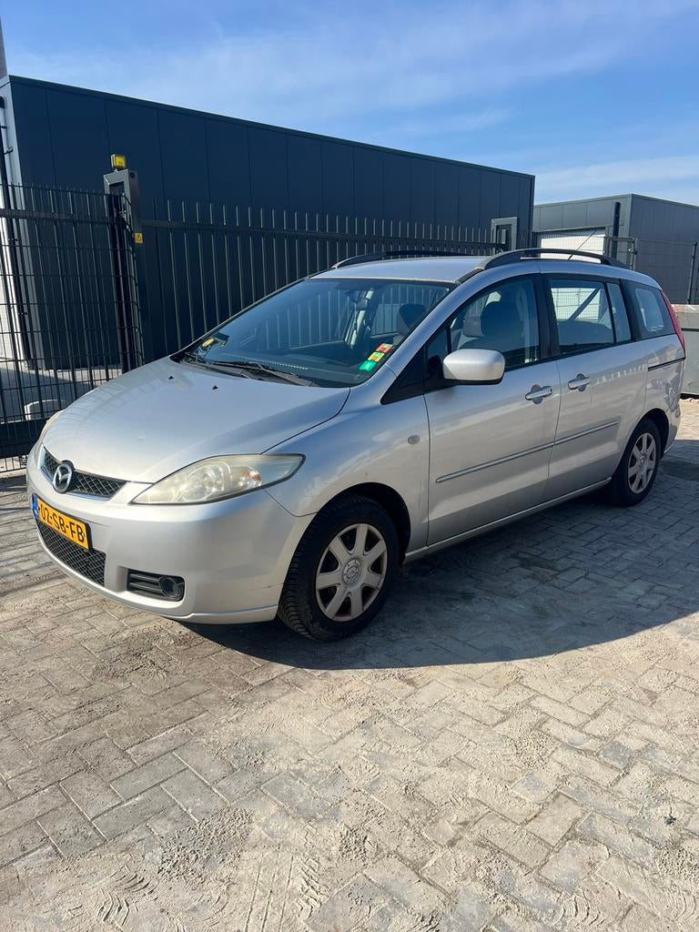 Mazda 5 1.8 benzine 7 peroons airco schuifdeuren, Auto's, Mazda, 1370 kg, 4 cilinders, 7 stoelen, Origineel Nederlands