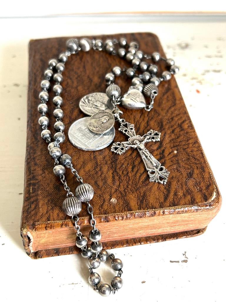 Antiek zilveren 835 rozenkrans met medailloins, Ophalen