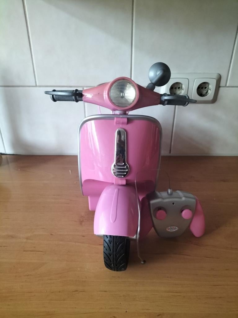 Baby Born scooter met afstandsbediening, Kinderen en Baby's, Speelgoed | Speelgoedvoertuigen, Ophalen, Gebruikt, Afstandsbediening