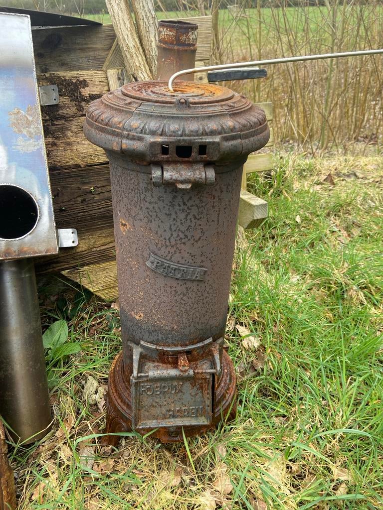 Antieke gietijzeren kachel 'Patria Fobrux Haren', Gebruikt, Houtkachel, Ophalen of Verzenden, Vrijstaand