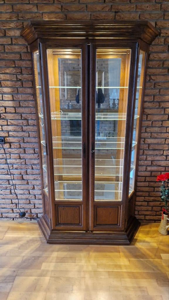 Vitrinekast massief donker eiken met verlichting., Ophalen, 25 tot 50 cm, 100 tot 150 cm, 150 tot 200 cm