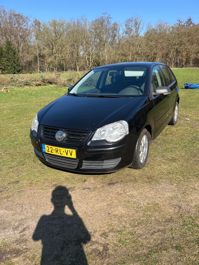Volkswagen Polo 1.4 55KW 2005 Zwart, Auto's, Voorwielaandrijving, 15 km/l, Zwart, Origineel Nederlands