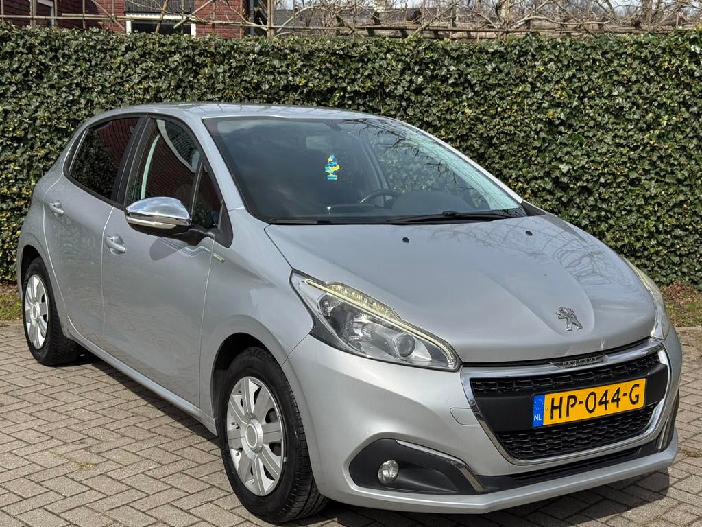 Peugeot 208 1.2 60KW/82PK 5-D 2015 Grijs, Auto's, Voorwielaandrijving, 31 €/maand, 1199 cc, 23 km/l