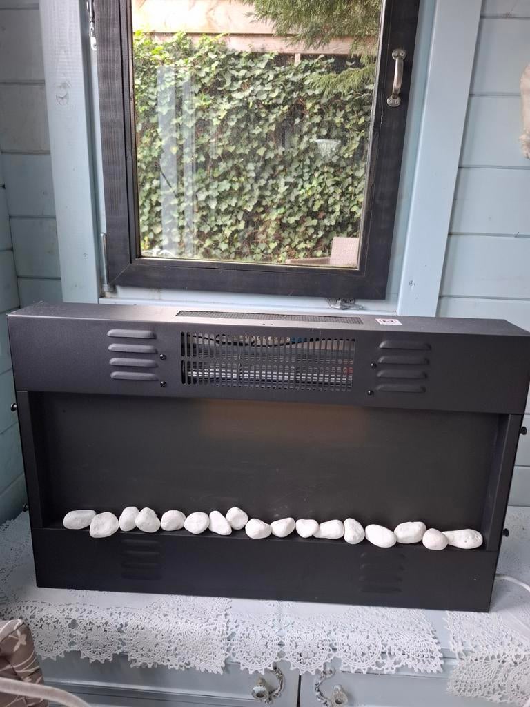 Flinq sfeerhaard met afstandsbediening, Ophalen