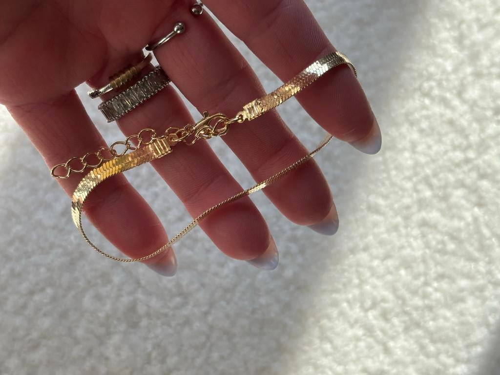 Stijlvolle roestvrijstalen armband, Ophalen of Verzenden, Nieuw, Goud, Staal