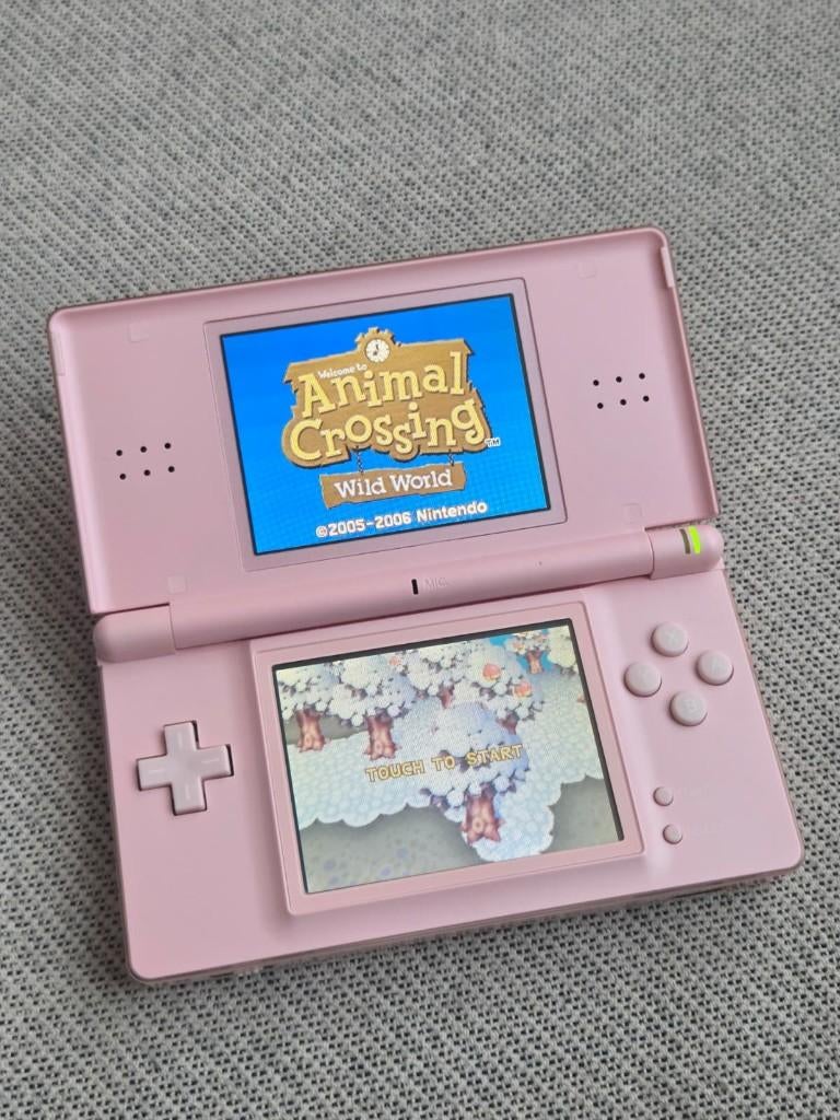 Nintendo DS Lite (Roze), Spelcomputers en Games, Spelcomputers | Nintendo DS, Met games, Ophalen of Verzenden, Zo goed als nieuw