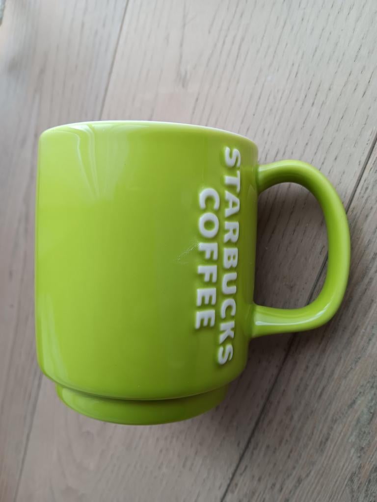 NEW Starbucks 2010 mok reliëf, Ophalen of Verzenden, Zo goed als nieuw, Effen, Kop(pen) en/of Schotel(s)