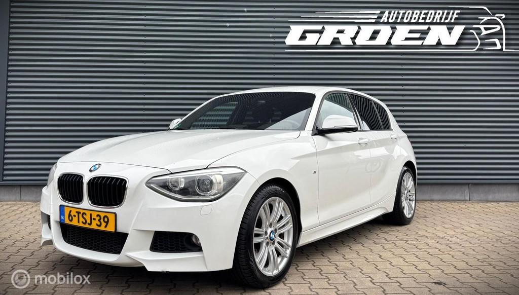 BMW 1-serie 116i High Executive M-PAKKET|PDC|STOELVERWARMING, Gebruikt, 4 cilinders, Wit, Origineel Nederlands