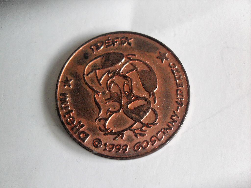 Asterix en Obelix Nutella Munt Idefix, Verzamelen, Ophalen of Verzenden, Asterix en Obelix, Gebruikt, Overige typen