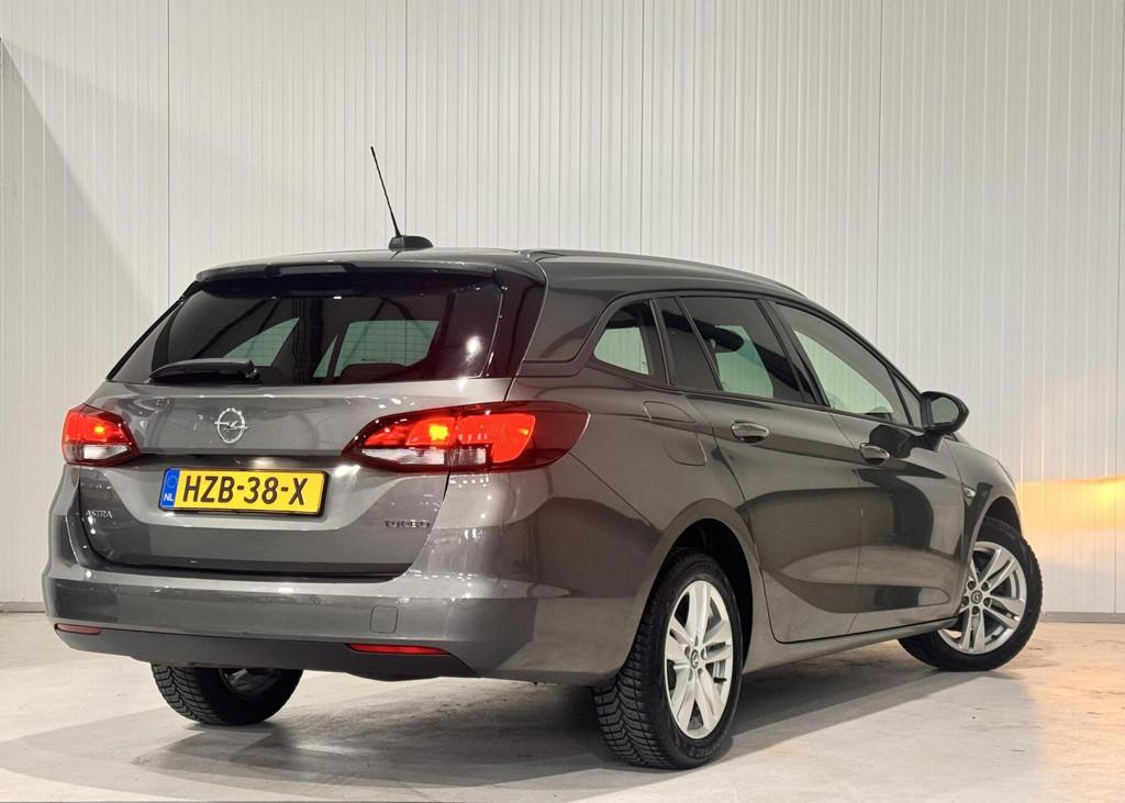 Opel Astra Sports Tourer 1.4 Innovation|AUTOMAAT|CARPLAY|, Stof, Gebruikt, Parkeersensor, 1240 kg