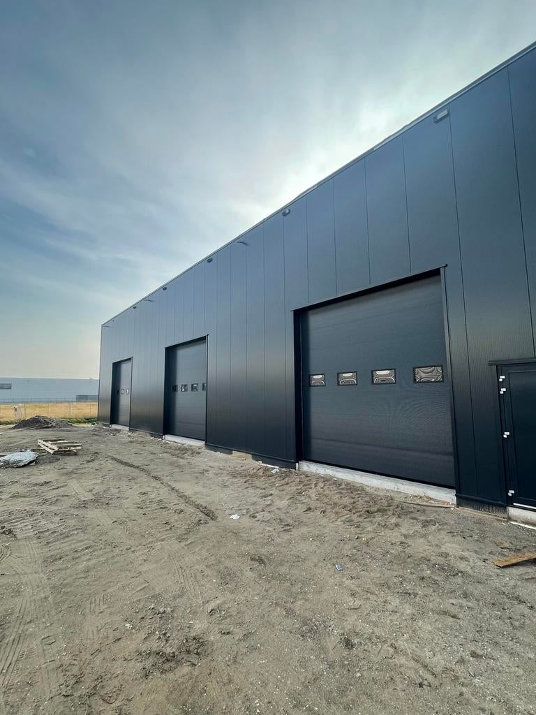 Nieuwe alle maten industriedeuren, overheaddeuren, roldeuren, Ophalen of Verzenden, 120 cm of meer, 215 cm of meer, Garagedeur