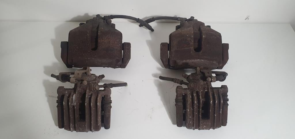 Remklauwen voor en achter VW Polo 1.6 TDI 2012, Ophalen of Verzenden, Gebruikt, Volkswagen