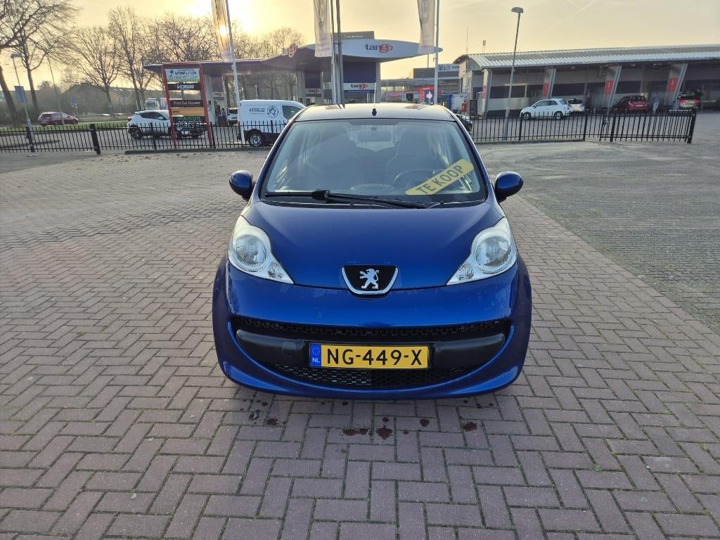 Peugeot 107 1.0 12V 3DR 2007 Blauw, Auto's, Voorwielaandrijving, Stof, 68 pk, Elektrische ramen