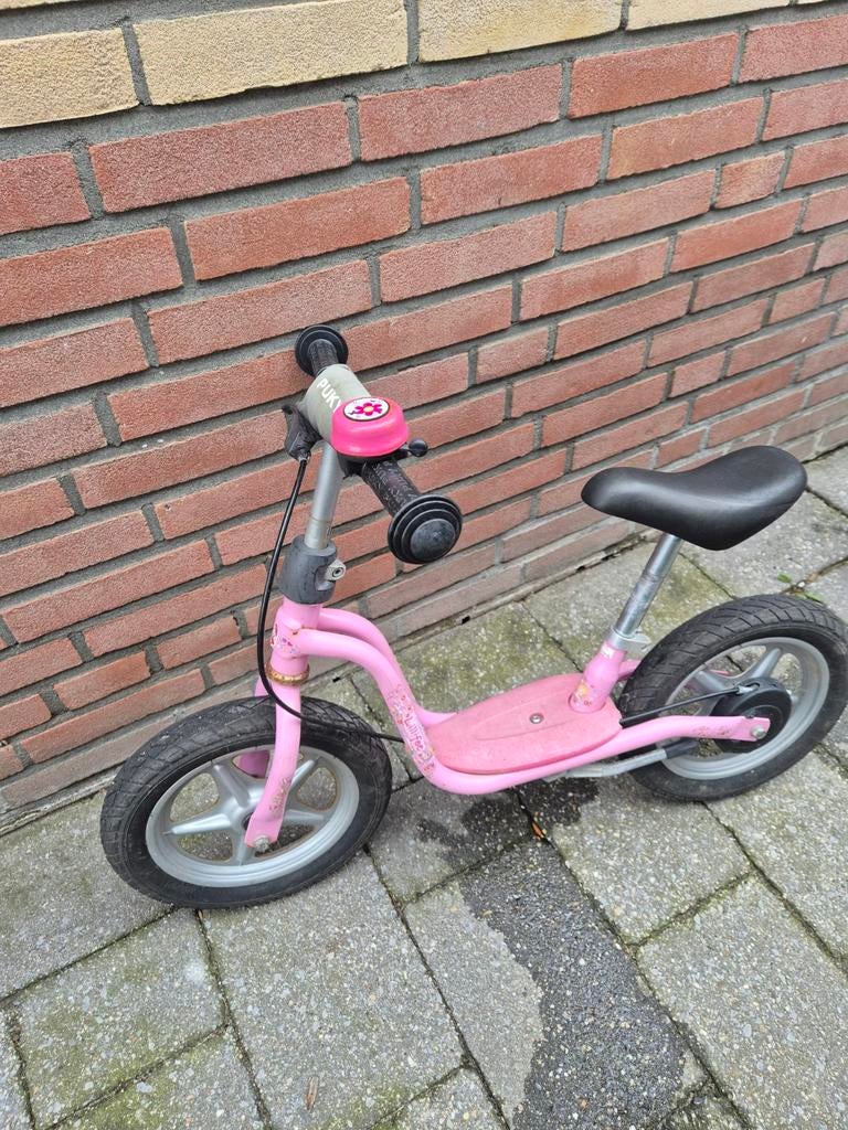 Roze Puky loopfiets, Ophalen